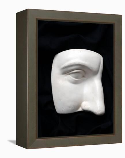A Cut Out of a Sculpture Including a Man's Face-Winfred Evers-Framed Premier Image Canvas