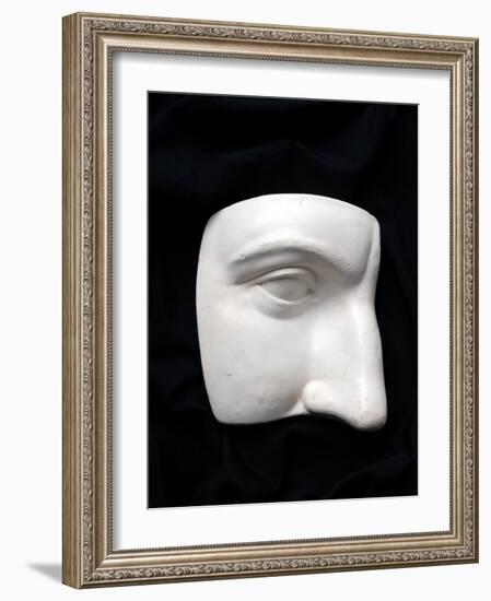 A Cut Out of a Sculpture Including a Man's Face-Winfred Evers-Framed Photographic Print