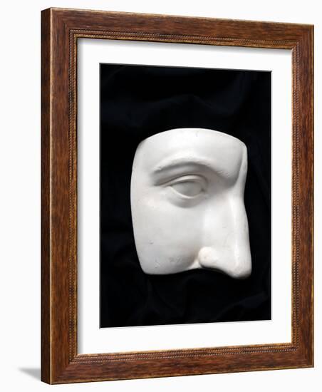 A Cut Out of a Sculpture Including a Man's Face-Winfred Evers-Framed Photographic Print