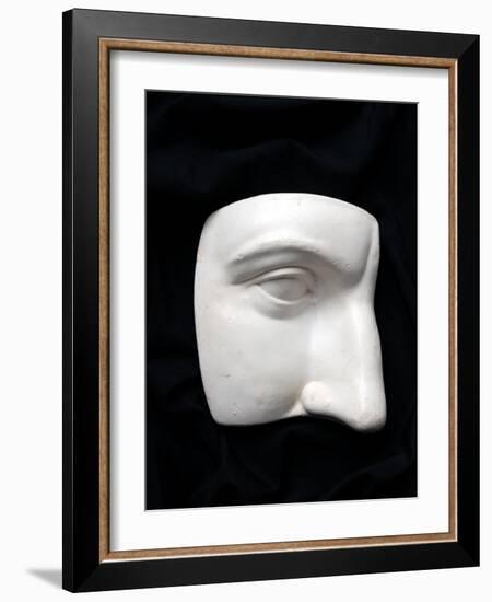 A Cut Out of a Sculpture Including a Man's Face-Winfred Evers-Framed Photographic Print