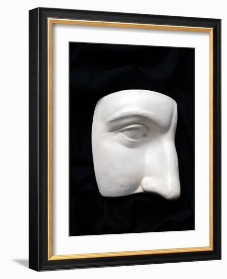 A Cut Out of a Sculpture Including a Man's Face-Winfred Evers-Framed Photographic Print