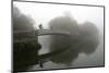 A cyclist on a bridge on Birmingham Canal Navigations (BCN), Birmingham, West Midlands, England, Un-Graham Lawrence-Mounted Photographic Print