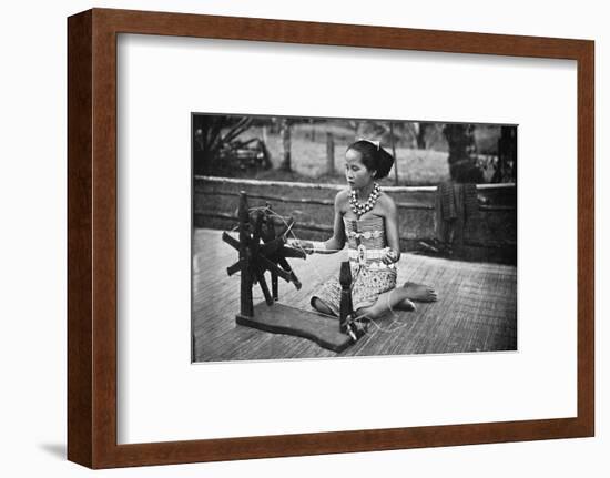 A Dayak girl at her spinning wheel, 1902-Unknown-Framed Photographic Print