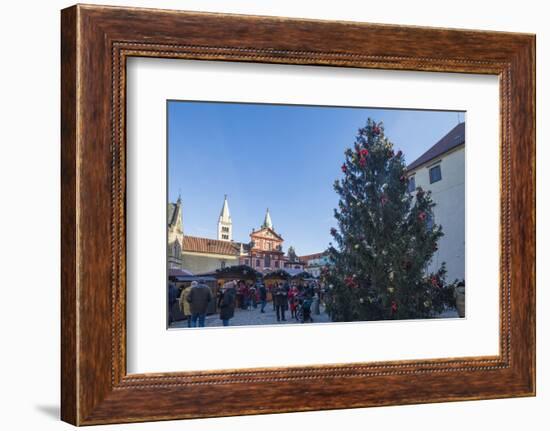 A decorated Christmas tree frames the St. George Church, Prague, Czech Republic, Europe-Roberto Moiola-Framed Photographic Print