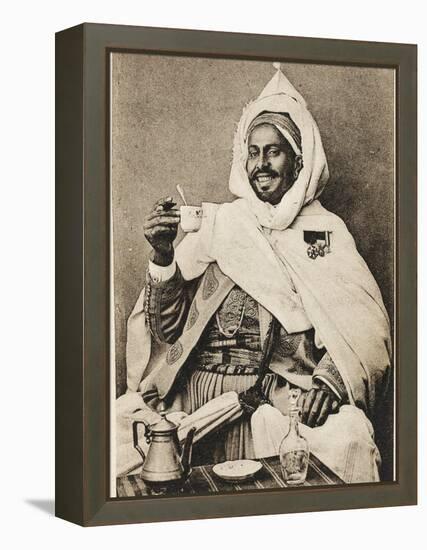 A Decorated Moroccan Tribal Chief Enjoying a Cup of Coffee-null-Framed Premier Image Canvas