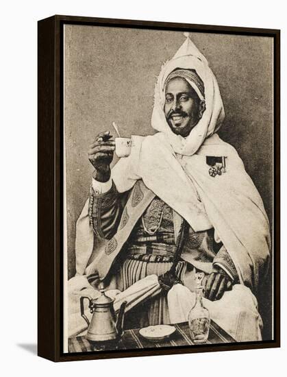 A Decorated Moroccan Tribal Chief Enjoying a Cup of Coffee-null-Framed Premier Image Canvas