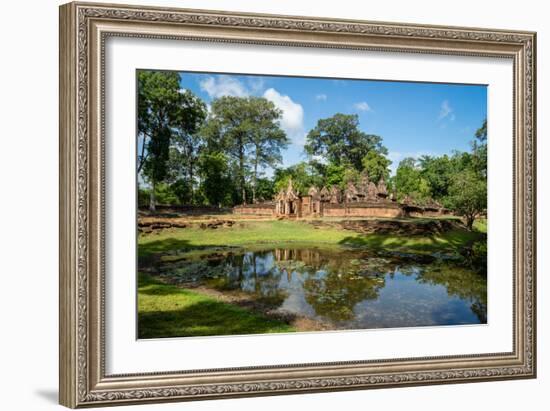 A deserted temple reflected in a lake in Siem Reap, Cambodia, Indochina, Southeast Asia, Asia-Logan Brown-Framed Photographic Print
