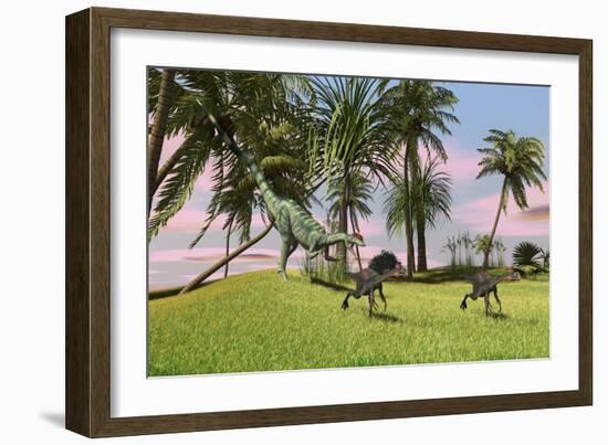 A Dilophosaurus Chasing Two Gigantoraptors across a Grassy Field-null-Framed Premium Giclee Print