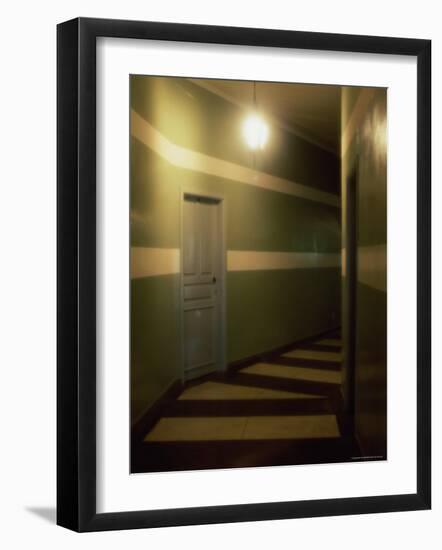 A Dimly Lit Winding Corridor-null-Framed Photographic Print