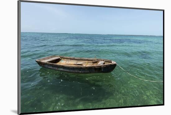 A Dingy Floats by Itself on Open Green Waters Near the Southern Coast of Cuba-James White-Mounted Photographic Print