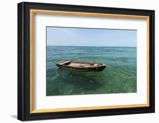 A Dingy Floats by Itself on Open Green Waters Near the Southern Coast of Cuba-James White-Framed Photographic Print