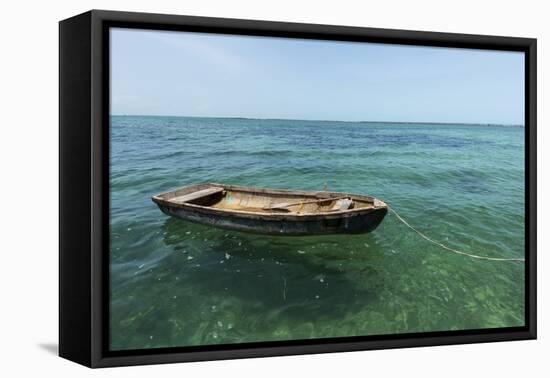 A Dingy Floats by Itself on Open Green Waters Near the Southern Coast of Cuba-James White-Framed Premier Image Canvas