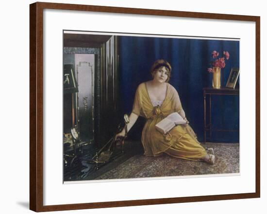 A Dreamy Young Lady Seated by the Fire with Book in Hand 'the Reverie'-null-Framed Photographic Print