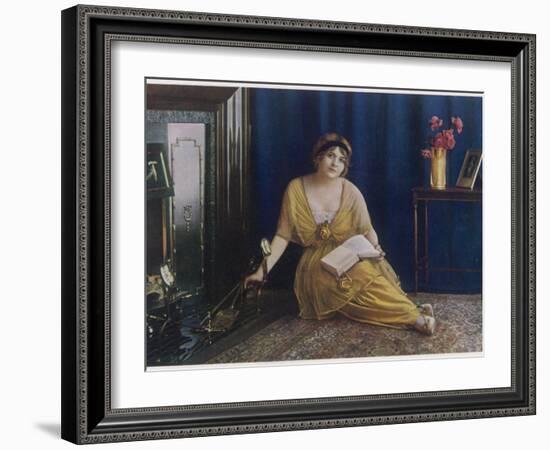 A Dreamy Young Lady Seated by the Fire with Book in Hand 'the Reverie'-null-Framed Photographic Print