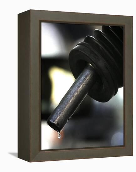 A Drip of Gas Falls from Nozzle at a Gasoline Station-null-Framed Premier Image Canvas