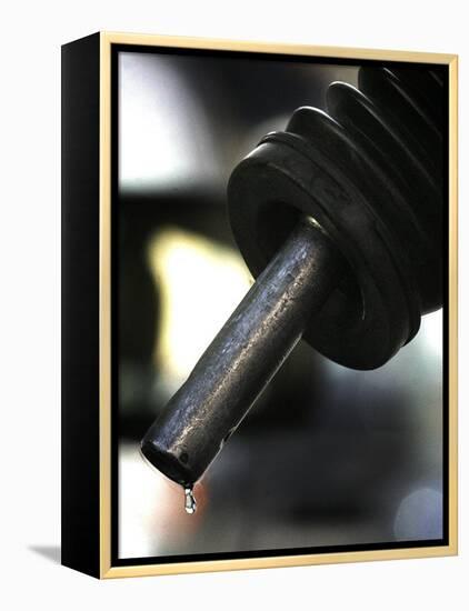 A Drip of Gas Falls from Nozzle at a Gasoline Station-null-Framed Premier Image Canvas