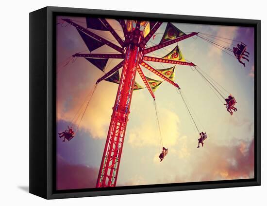 A Fair Ride Shot with a Long Exposure at Dusk Toned with a Retro Vintage Instagram Filter-graphicphoto-Framed Premier Image Canvas