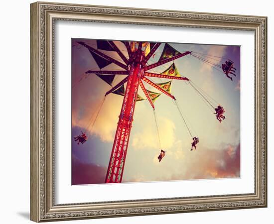 A Fair Ride Shot with a Long Exposure at Dusk Toned with a Retro Vintage Instagram Filter-graphicphoto-Framed Photographic Print