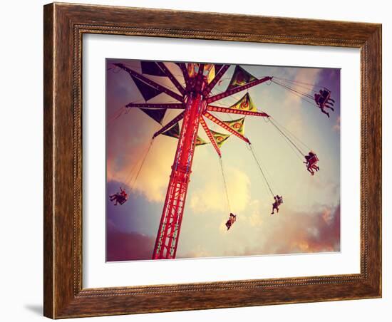 A Fair Ride Shot with a Long Exposure at Dusk Toned with a Retro Vintage Instagram Filter-graphicphoto-Framed Photographic Print