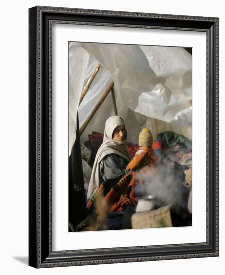 A Family from the Quake-Affected Rangwad Village Sits Near a Fireplace-null-Framed Photographic Print