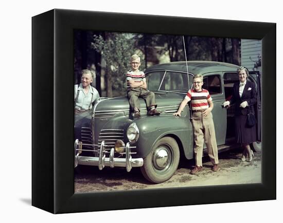 A Family Poses on and around their Plymouth Automobile, Ca. 1953-null-Framed Premier Image Canvas