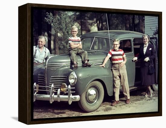 A Family Poses on and around their Plymouth Automobile, Ca. 1953-null-Framed Premier Image Canvas