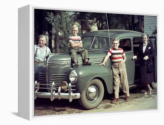 A Family Poses on and around their Plymouth Automobile, Ca. 1953-null-Framed Premier Image Canvas