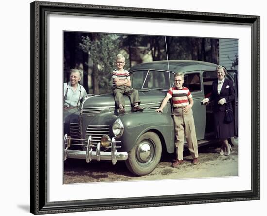 A Family Poses on and around their Plymouth Automobile, Ca. 1953-null-Framed Photographic Print