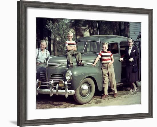 A Family Poses on and around their Plymouth Automobile, Ca. 1953-null-Framed Photographic Print