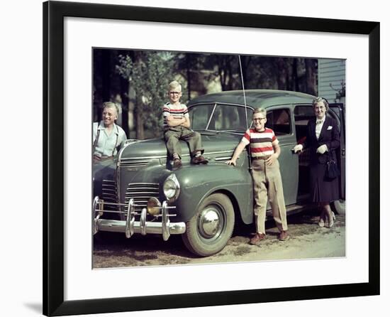 A Family Poses on and around their Plymouth Automobile, Ca. 1953-null-Framed Photographic Print