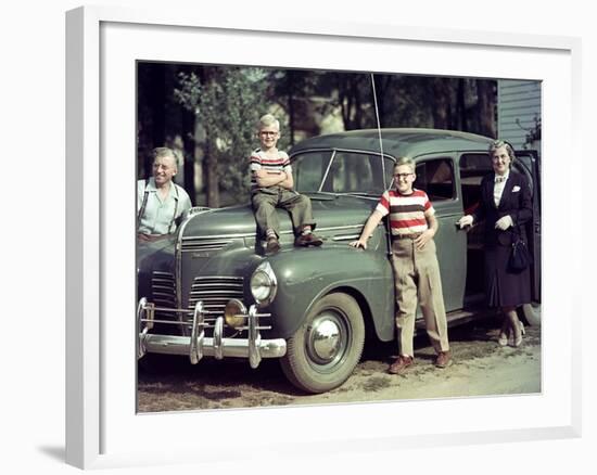 A Family Poses on and around their Plymouth Automobile, Ca. 1953-null-Framed Photographic Print