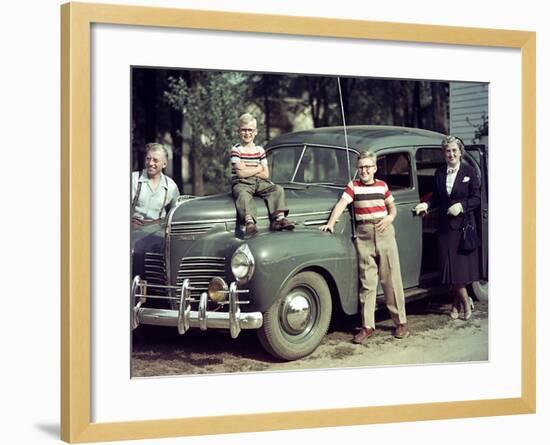 A Family Poses on and around their Plymouth Automobile, Ca. 1953-null-Framed Photographic Print