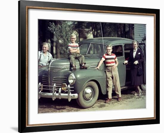 A Family Poses on and around their Plymouth Automobile, Ca. 1953-null-Framed Photographic Print