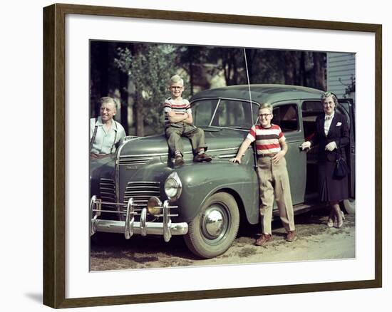 A Family Poses on and around their Plymouth Automobile, Ca. 1953-null-Framed Photographic Print