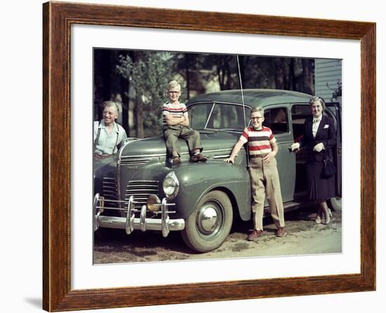 A Family Poses on and around their Plymouth Automobile, Ca. 1953-null-Framed Photographic Print