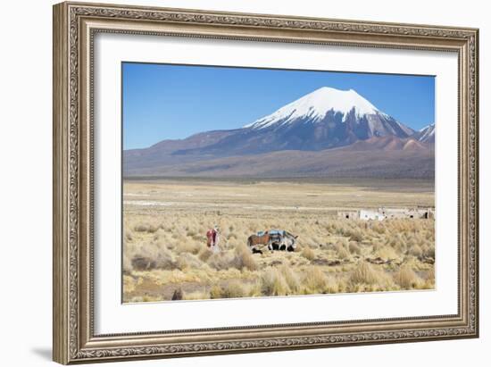 A Farmer Crosses a Landscape Below a Volcano in Sajama National Park-Alex Saberi-Framed Photographic Print