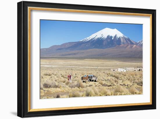 A Farmer Crosses a Landscape Below a Volcano in Sajama National Park-Alex Saberi-Framed Photographic Print