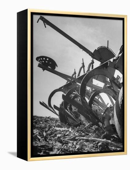A Farmer's Harrow Digging into it the Ground-null-Framed Premier Image Canvas
