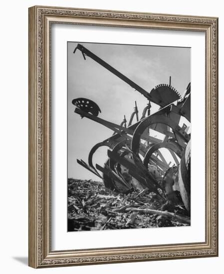 A Farmer's Harrow Digging into it the Ground-null-Framed Photographic Print