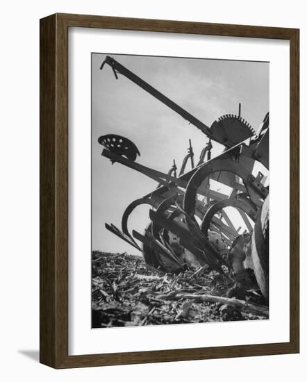 A Farmer's Harrow Digging into it the Ground-null-Framed Photographic Print