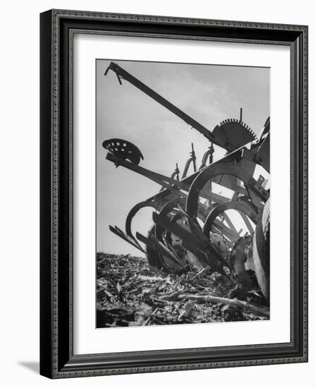 A Farmer's Harrow Digging into it the Ground-null-Framed Photographic Print