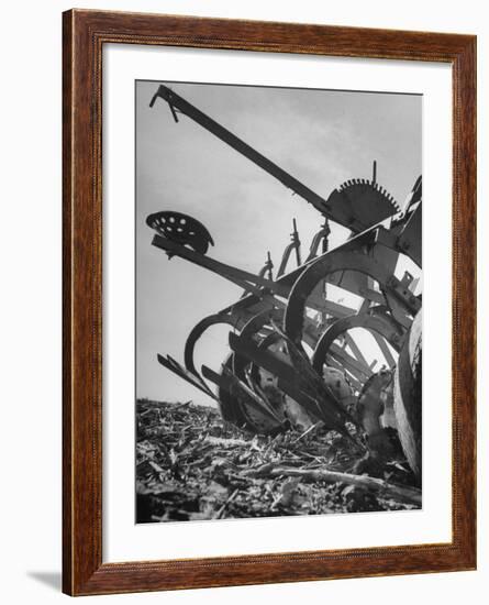 A Farmer's Harrow Digging into it the Ground-null-Framed Photographic Print