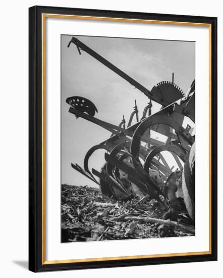 A Farmer's Harrow Digging into it the Ground-null-Framed Photographic Print