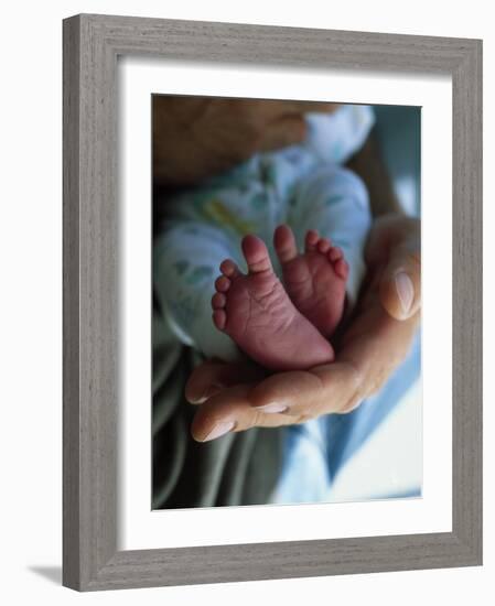 A Father Holding His Baby's Feet-Mitch Diamond-Framed Photographic Print