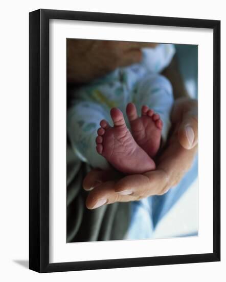 A Father Holding His Baby's Feet-Mitch Diamond-Framed Photographic Print