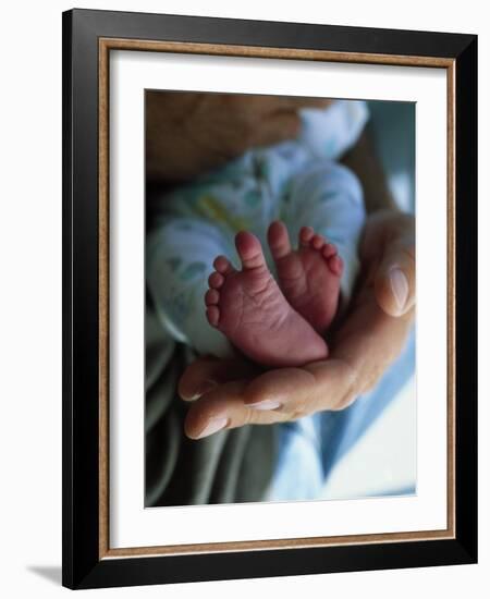 A Father Holding His Baby's Feet-Mitch Diamond-Framed Photographic Print