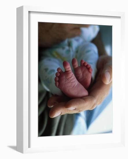 A Father Holding His Baby's Feet-Mitch Diamond-Framed Photographic Print