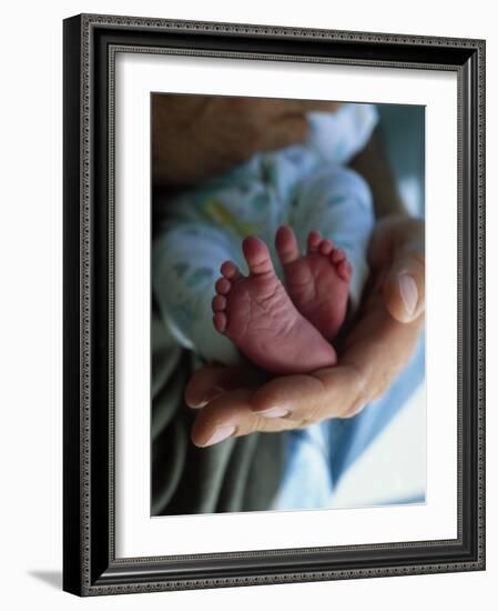 A Father Holding His Baby's Feet-Mitch Diamond-Framed Photographic Print
