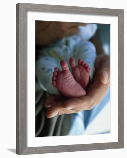 A Father Holding His Baby's Feet-Mitch Diamond-Framed Photographic Print