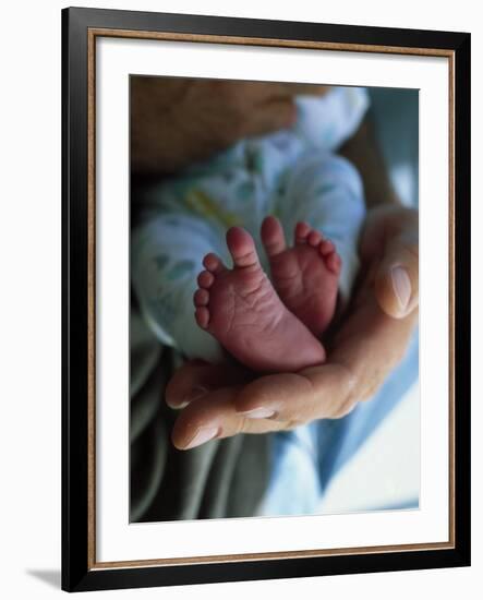 A Father Holding His Baby's Feet-Mitch Diamond-Framed Photographic Print